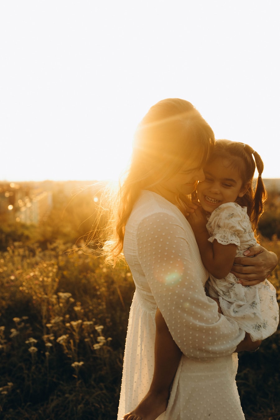 Mother embracing her daughter